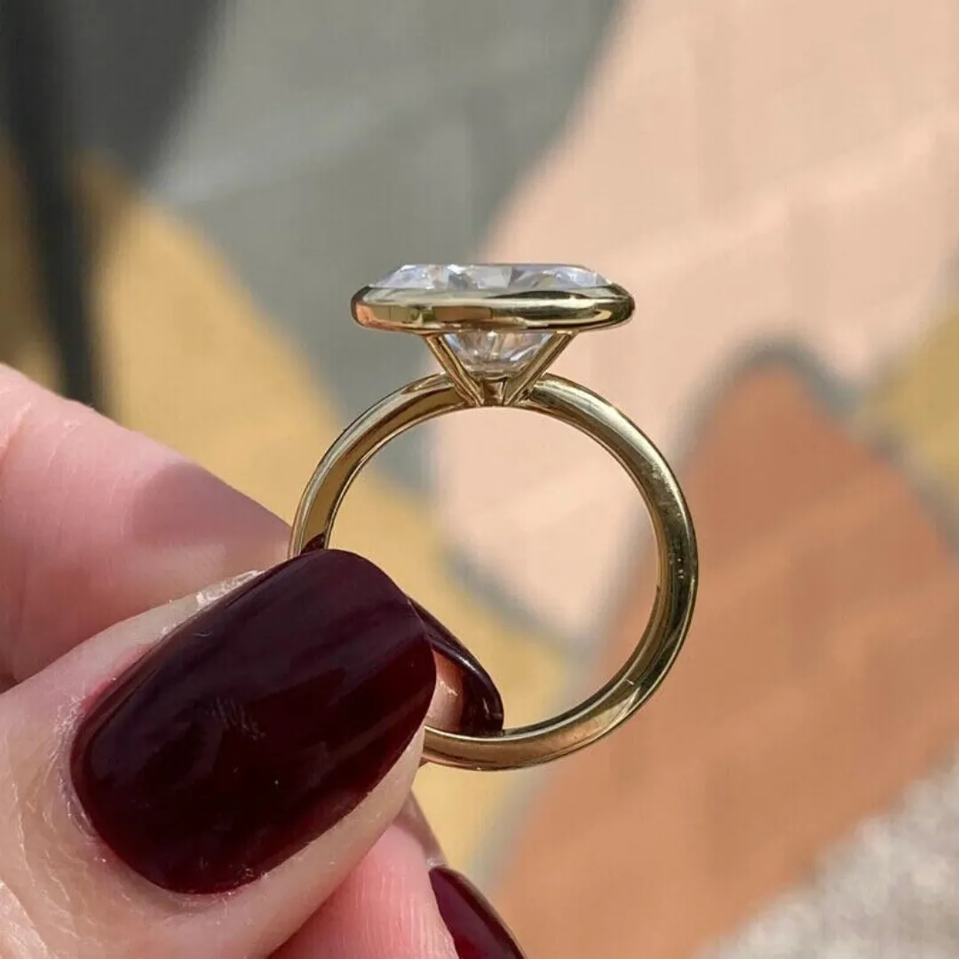 /public/photos/live/Oval Moissanite East West Bezel Set Solitaire Ring 624 (3).webp